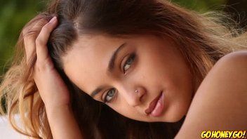 A gorgeous teenager touches live pussy